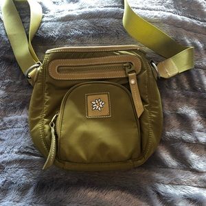 Green Sherpani cross body purse.